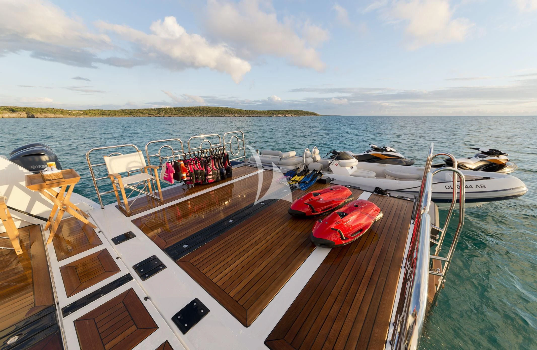 a boat is parked on the side of the water aboard BELLA Yacht for Sale