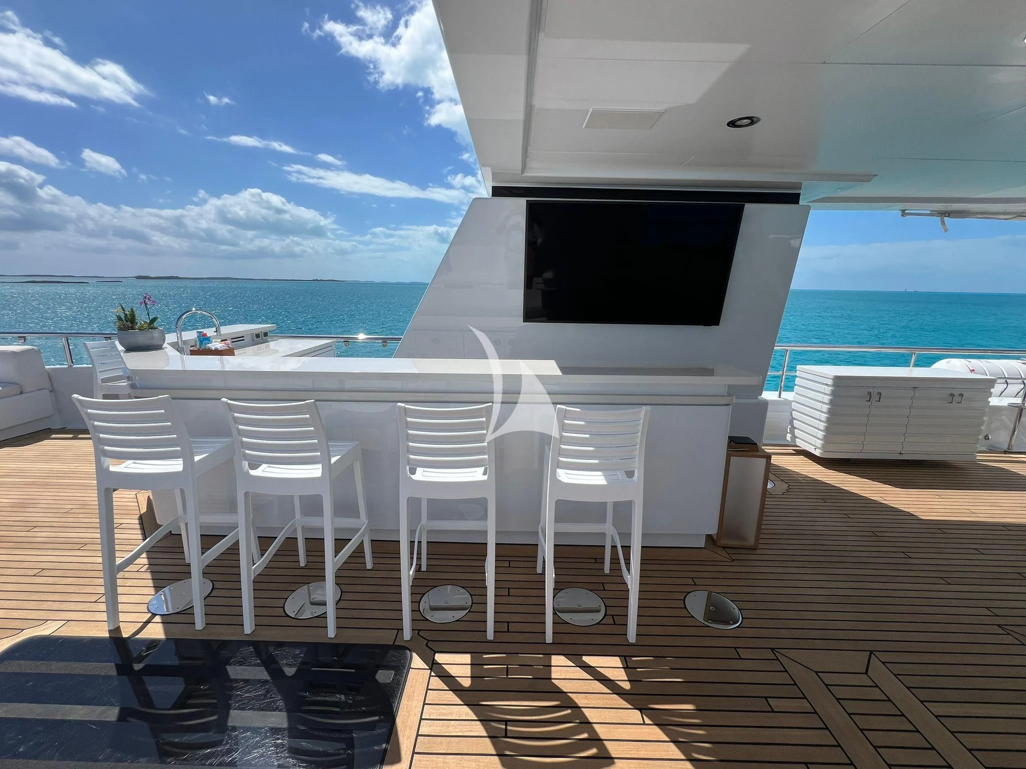 a room with a table and chairs aboard BELLA Yacht for Sale