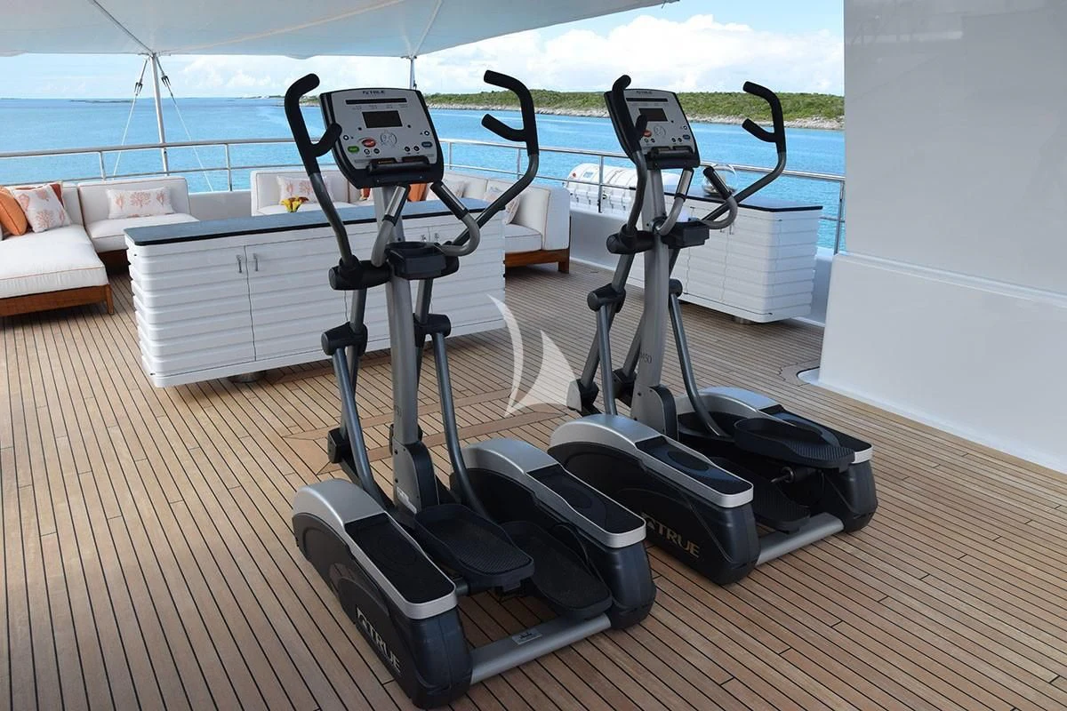 a camera on a table aboard BELLA Yacht for Sale