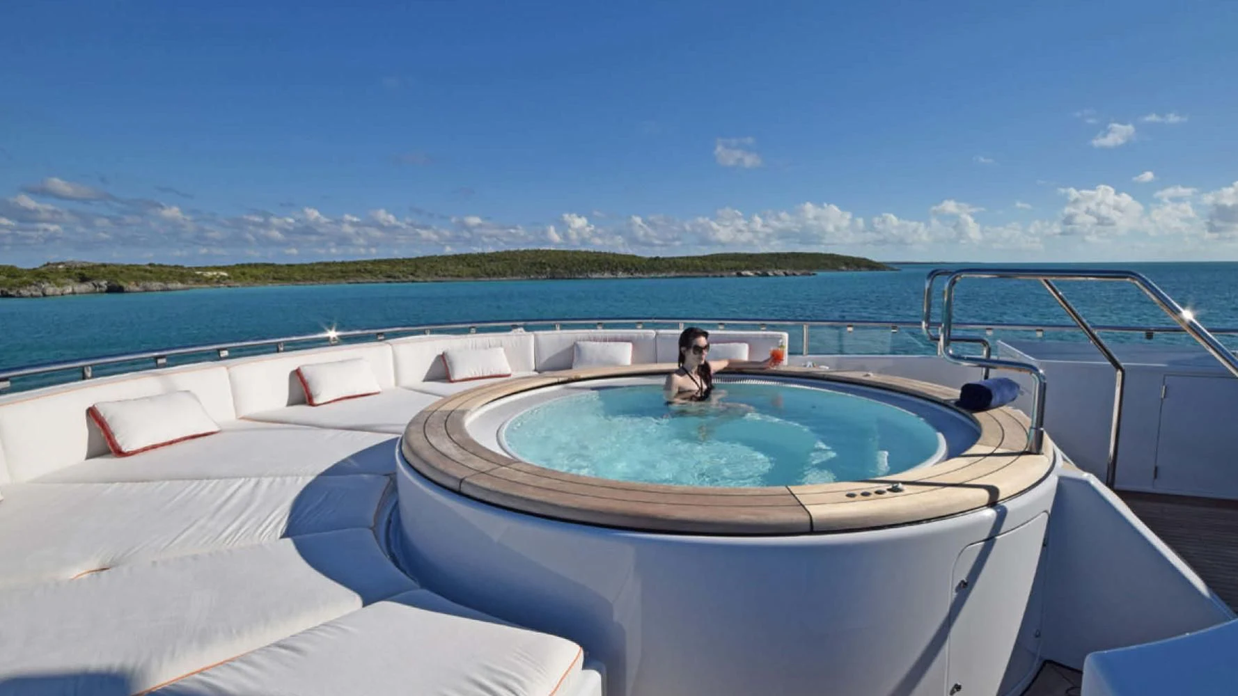 a person sitting in a pool aboard BELLA Yacht for Sale