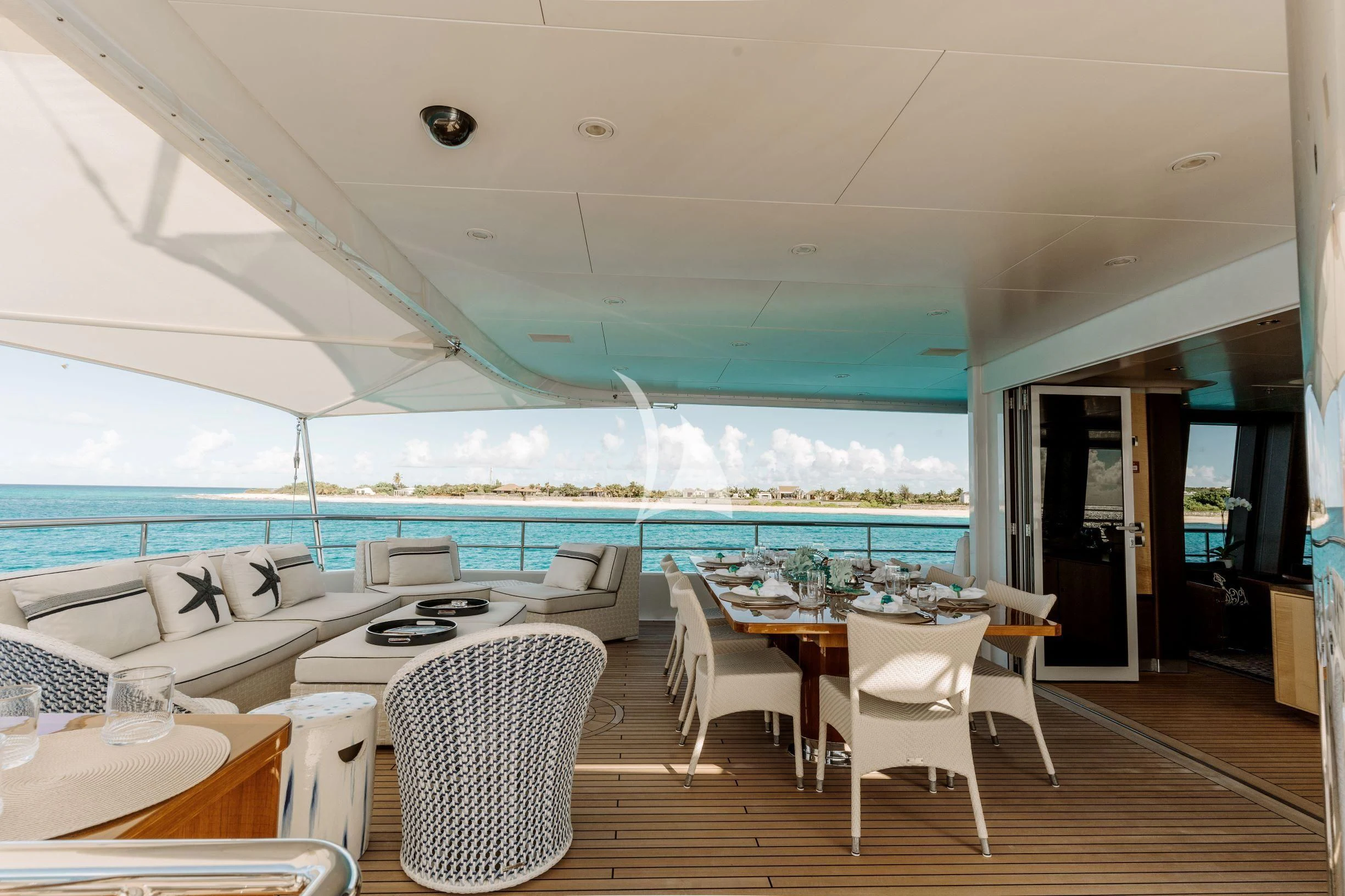 a room with a table chairs and a large window aboard BELLA Yacht for Sale