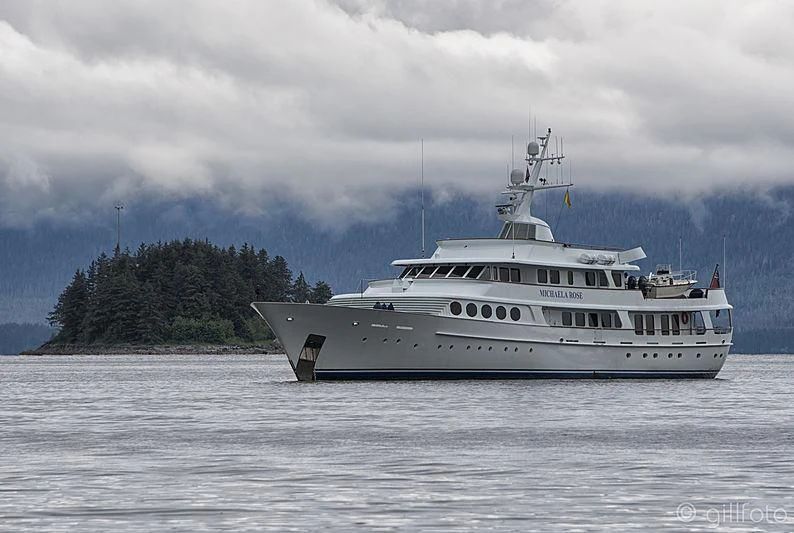 a large white boat on the water aboard MICHAELA ROSE Yacht for Sale