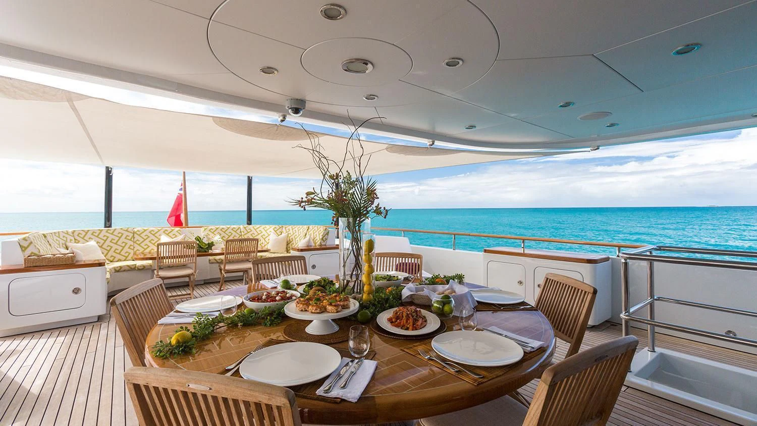 a table set for a meal on a boat aboard MICHAELA ROSE Yacht for Sale