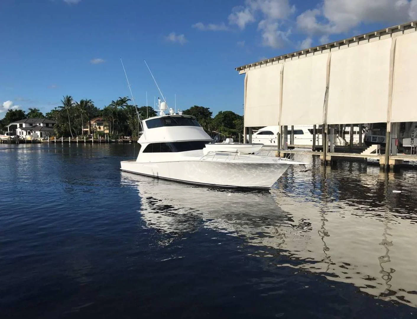 a boat parked in a harbor aboard PITTY Yacht for Sale