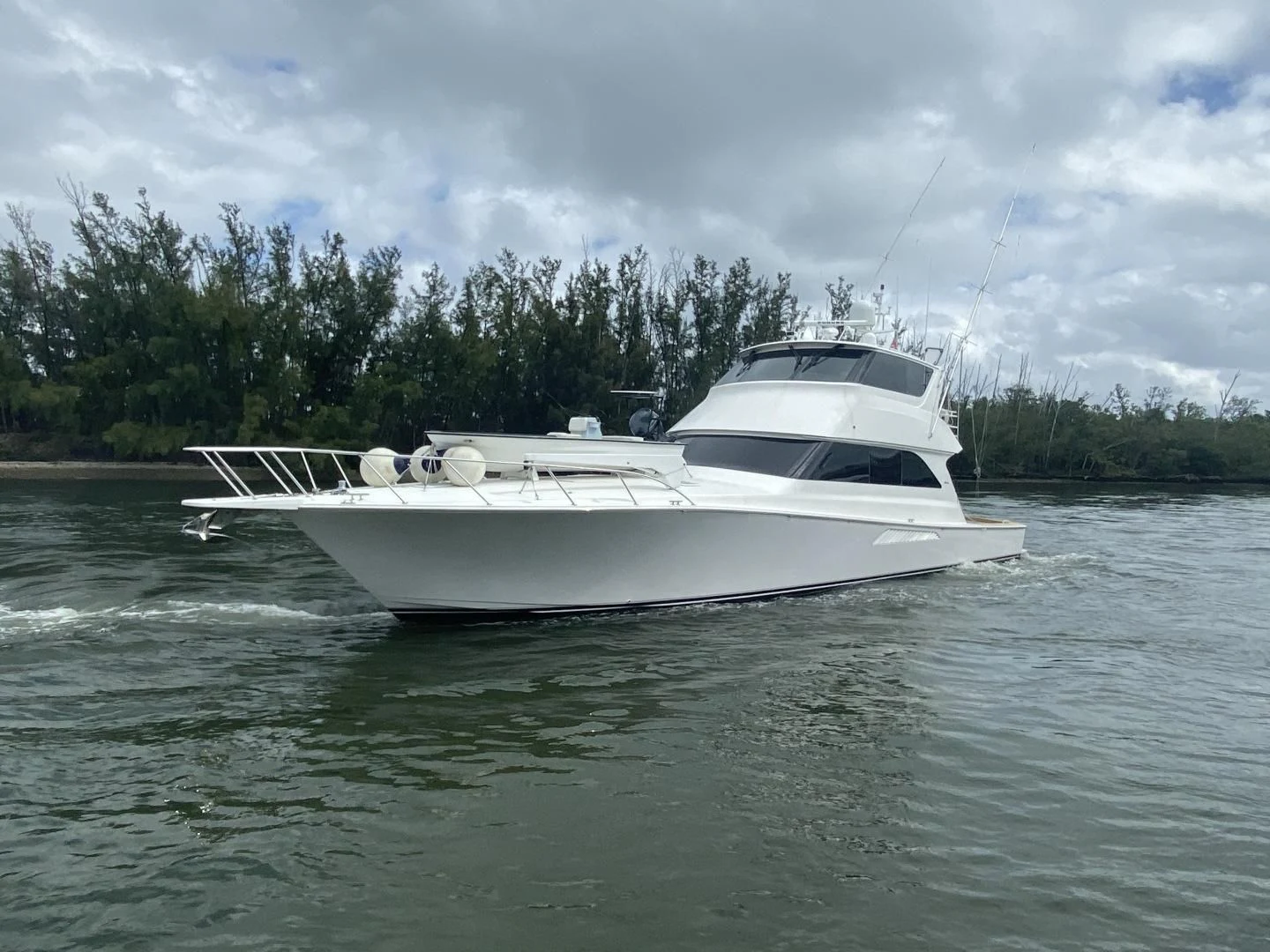 a white boat on the water aboard PITTY Yacht for Sale