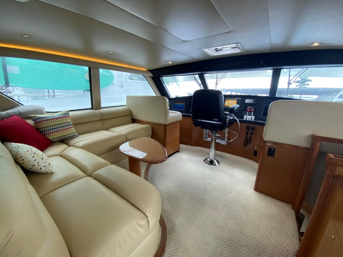 a room with a couch and a chair aboard PITTY Yacht for Sale