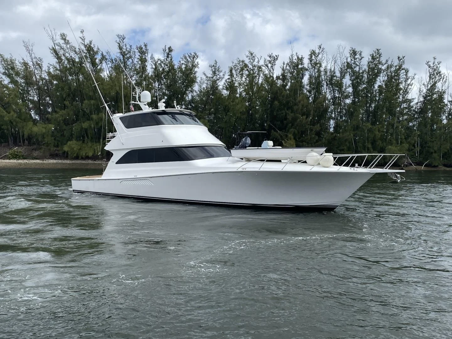 a white yacht on the water aboard PITTY Yacht for Sale