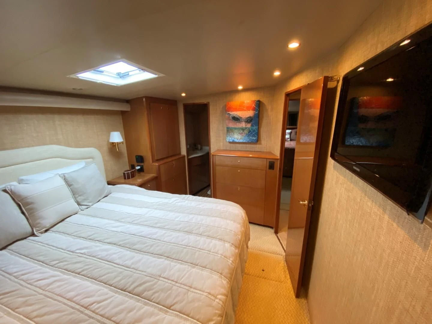 a bedroom with a bed aboard PITTY Yacht for Sale