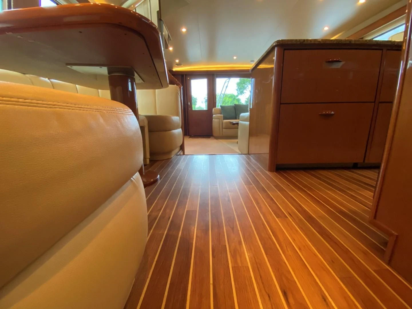 a room with a wood floor and a wood cabinet and a wood floor aboard PITTY Yacht for Sale