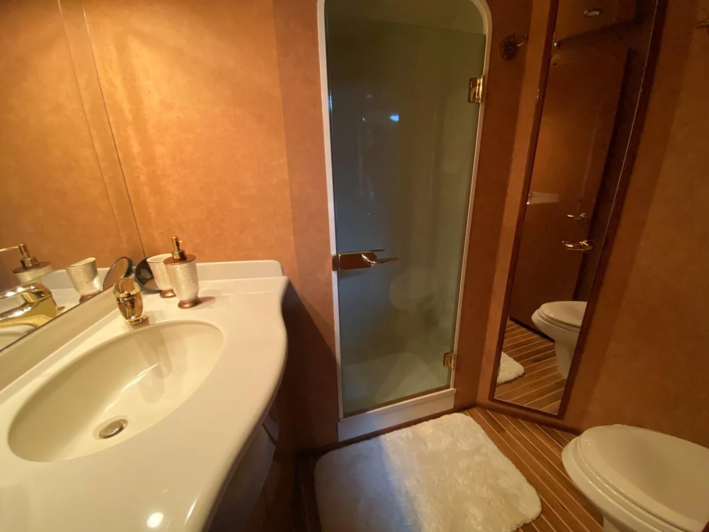 a bathroom with a sink and a toilet aboard PITTY Yacht for Sale