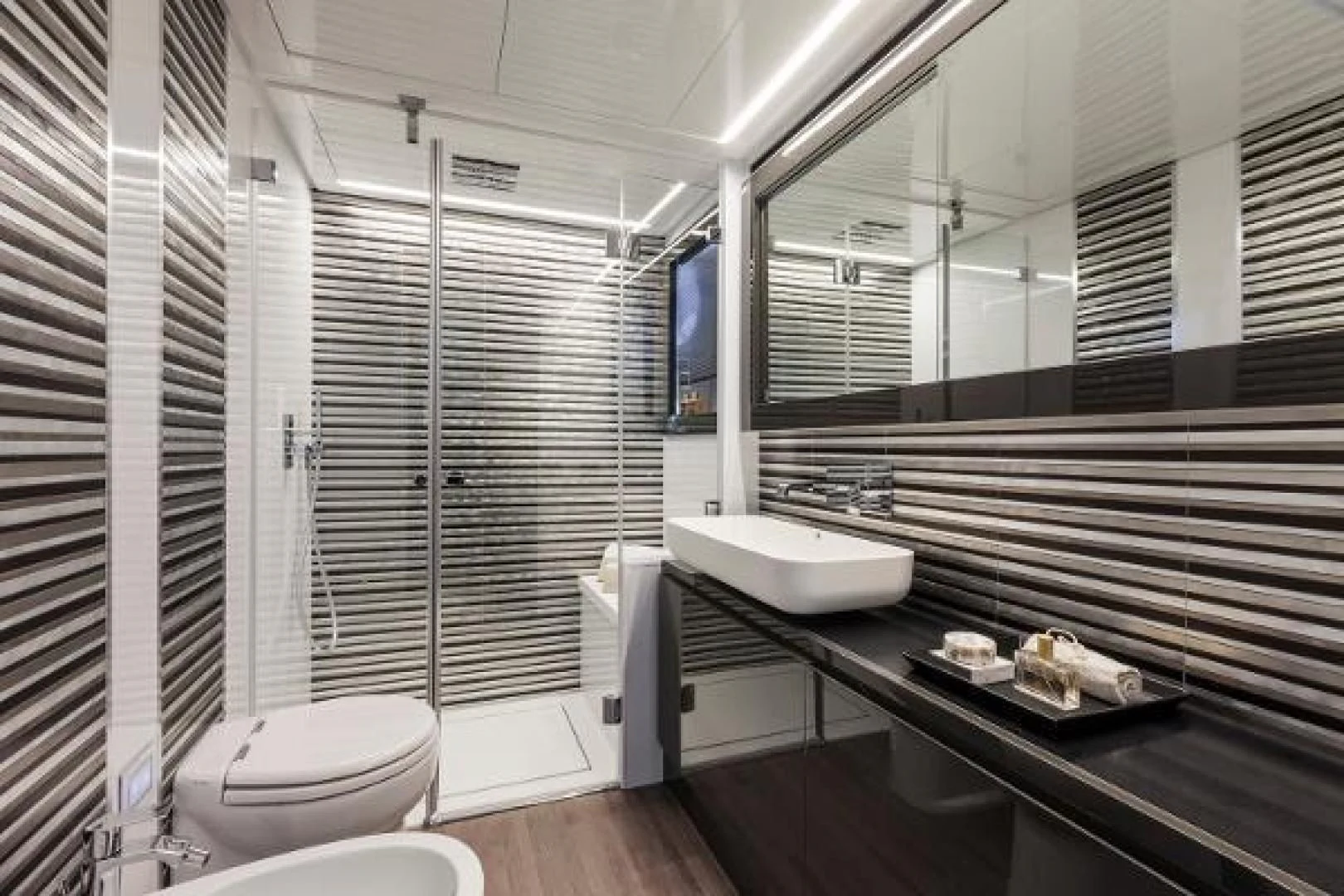 a bathroom with a sink and a mirror aboard STAR Yacht for Sale