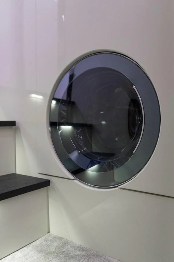 a black circular object with a silver circle on a white surface aboard STAR Yacht for Sale
