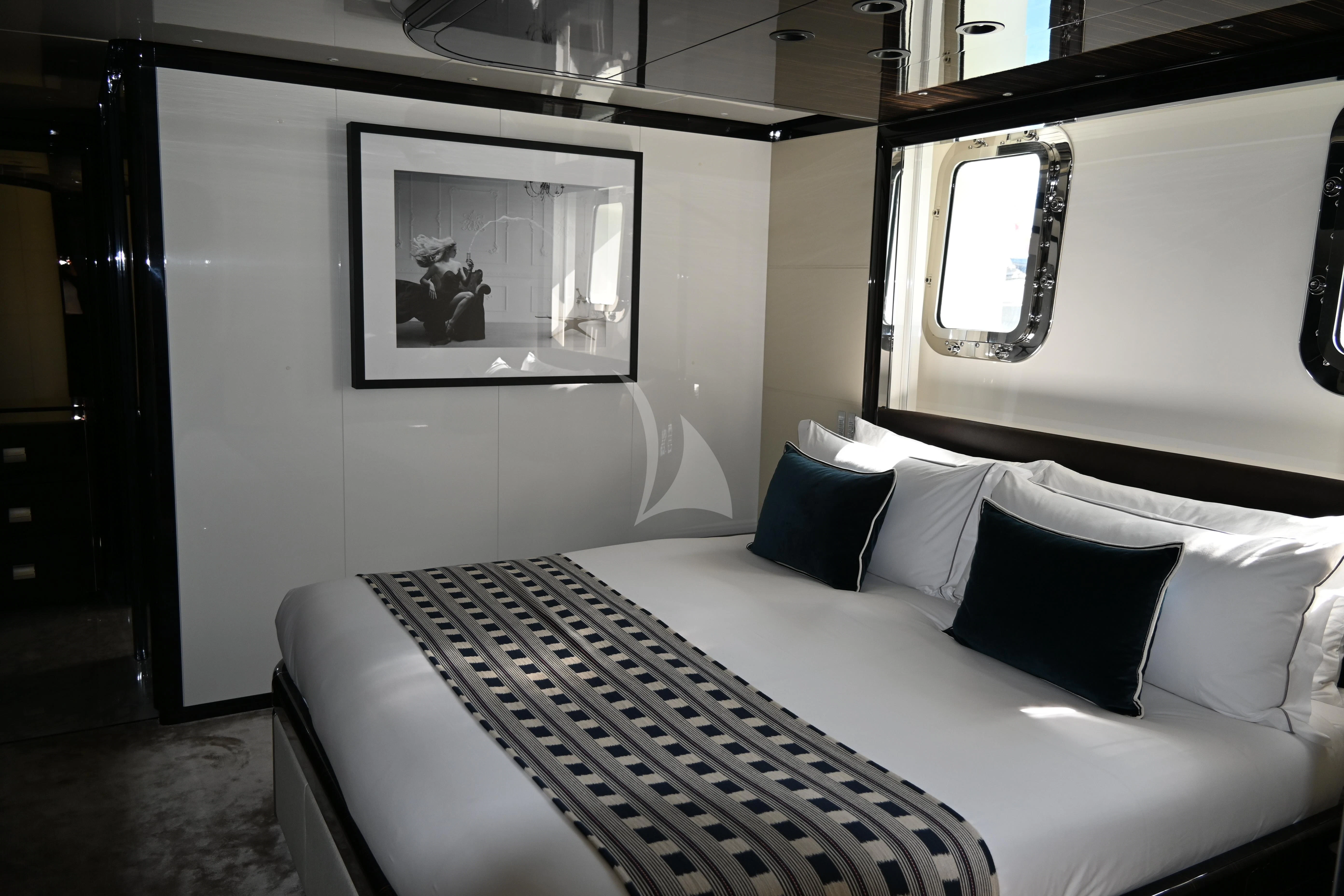 a bed with pillows aboard ANDIAMO Yacht for Sale