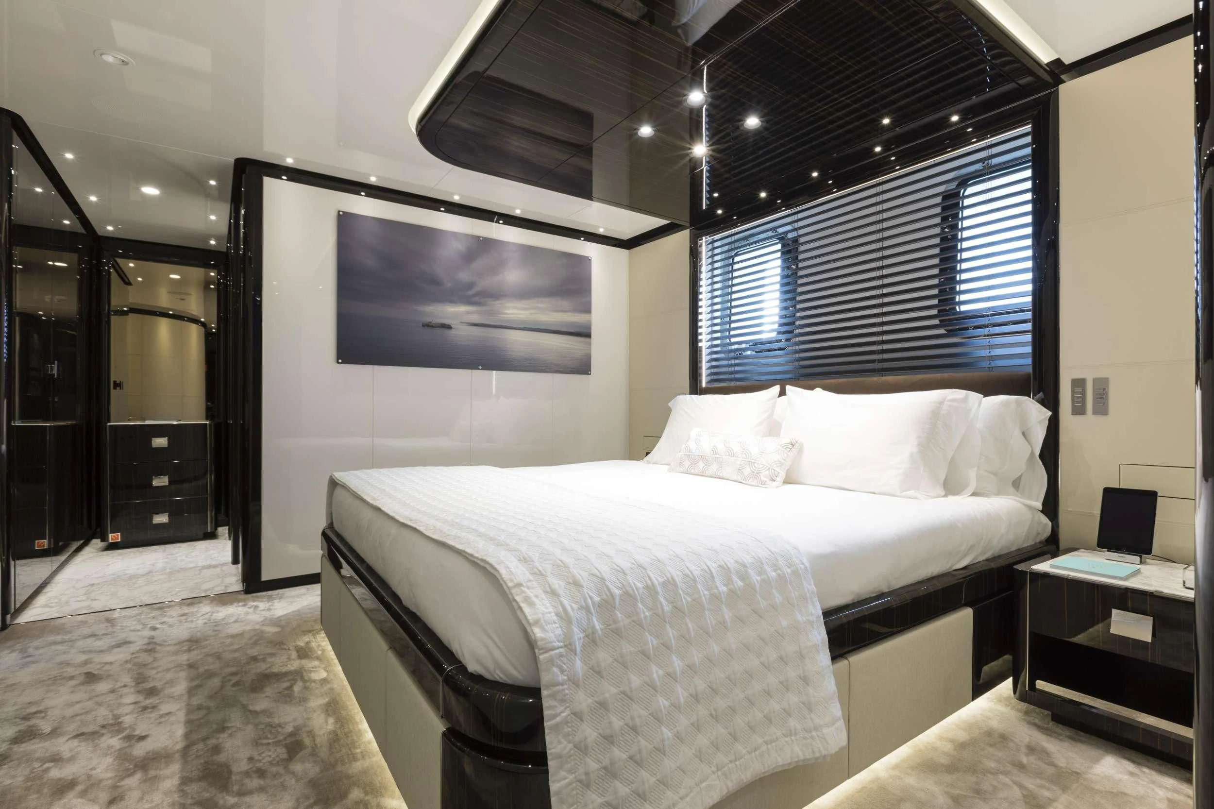 a bed in a room aboard ANDIAMO Yacht for Sale