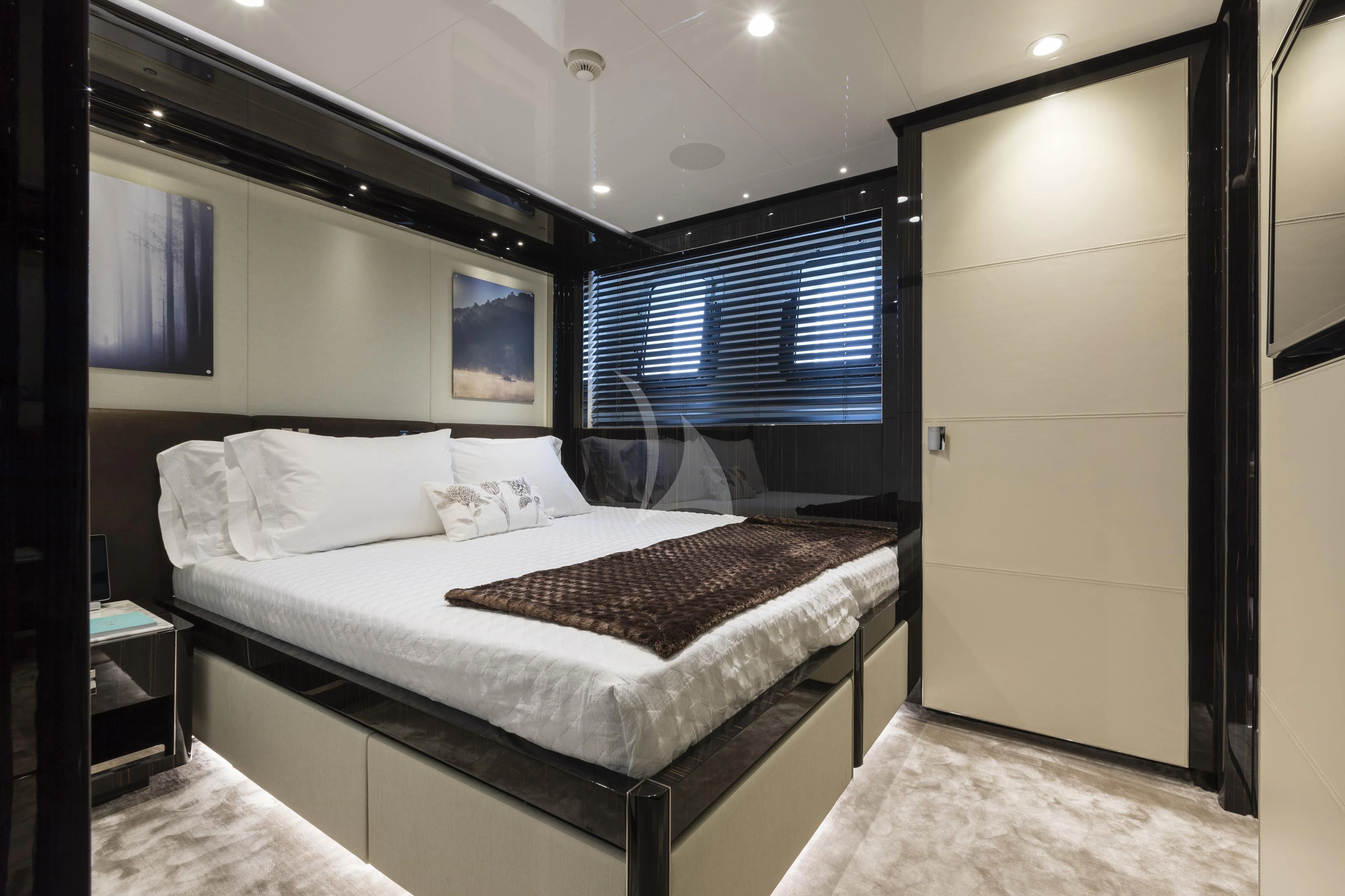a bed in a room aboard ANDIAMO Yacht for Sale