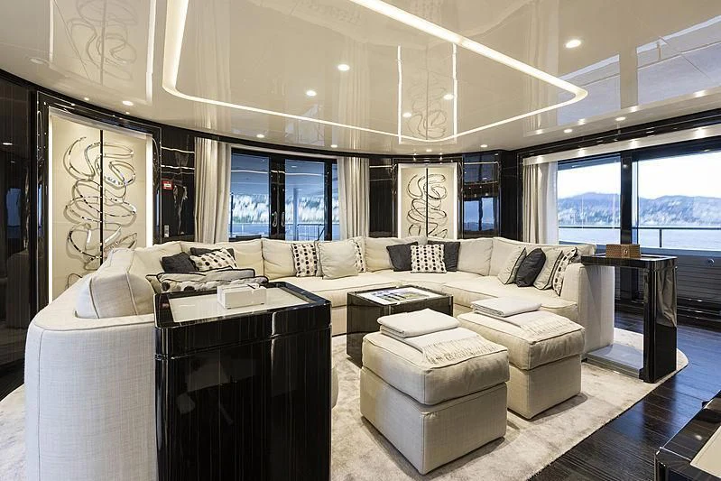 a large living room with a large window aboard ANDIAMO Yacht for Sale