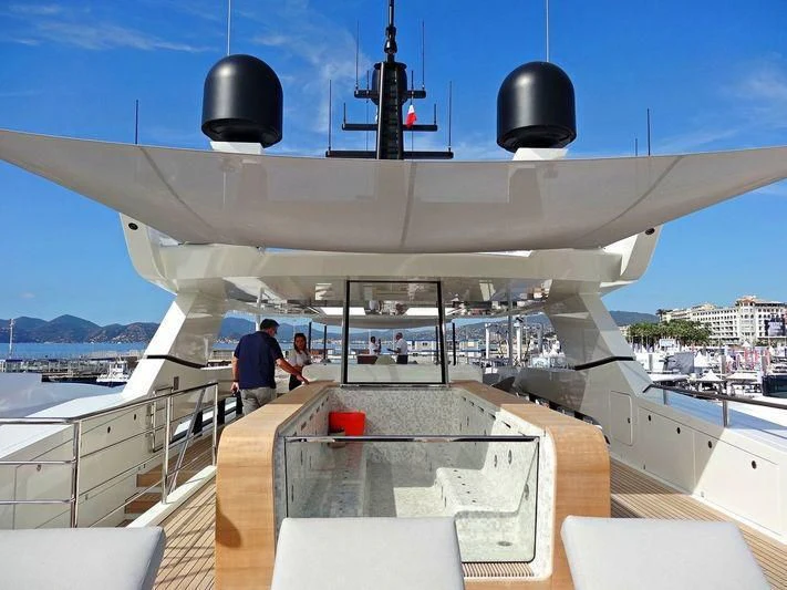 a large military ship aboard ANDIAMO Yacht for Sale