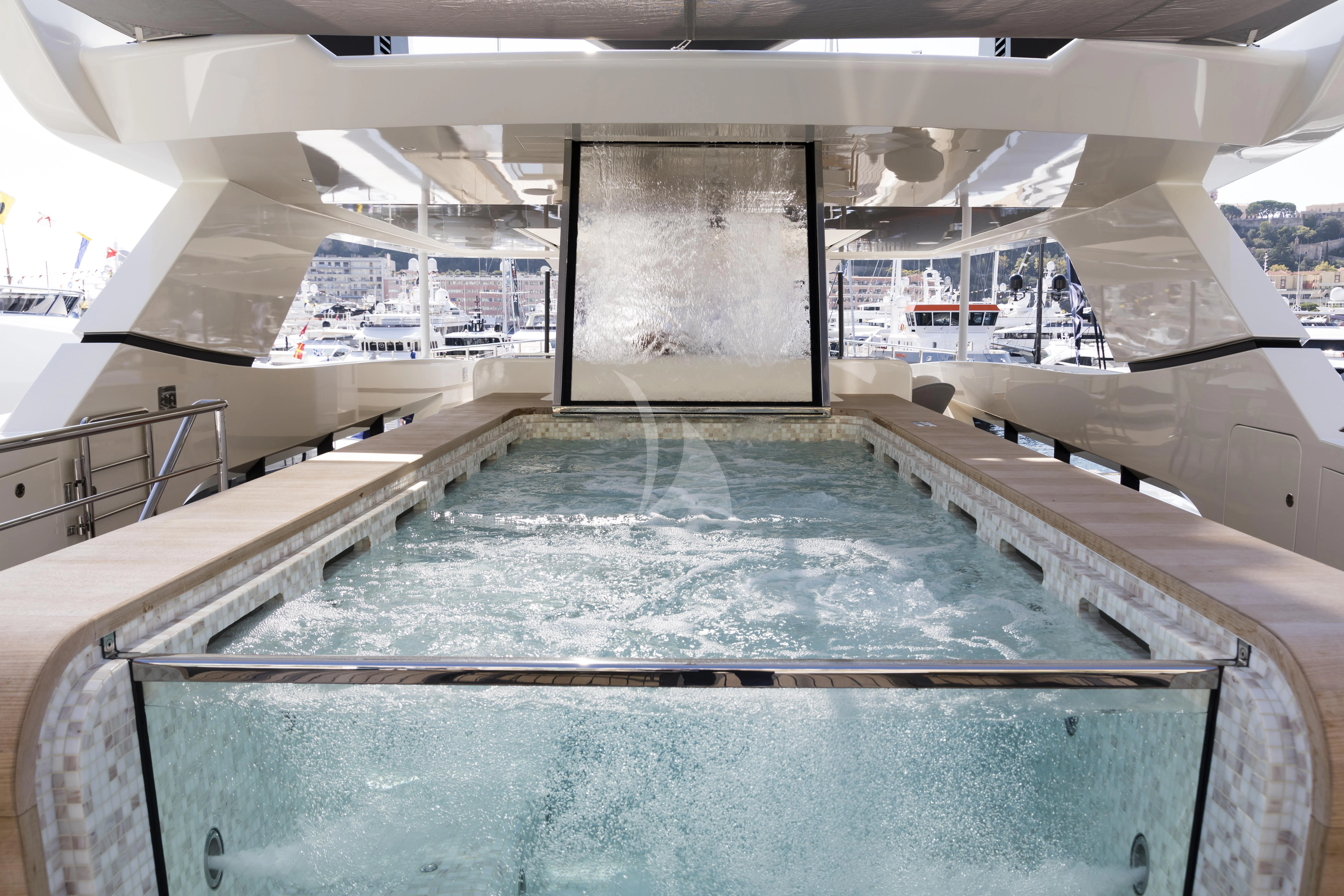a large indoor swimming pool aboard ANDIAMO Yacht for Sale