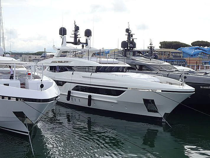 a group of boats are parked in a harbor aboard ANDIAMO Yacht for Sale