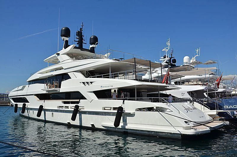 a white yacht docked aboard ANDIAMO Yacht for Sale