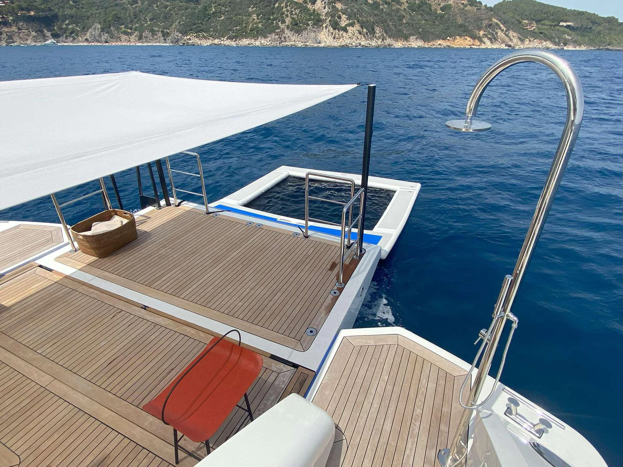 a boat on the water aboard ANDIAMO Yacht for Sale