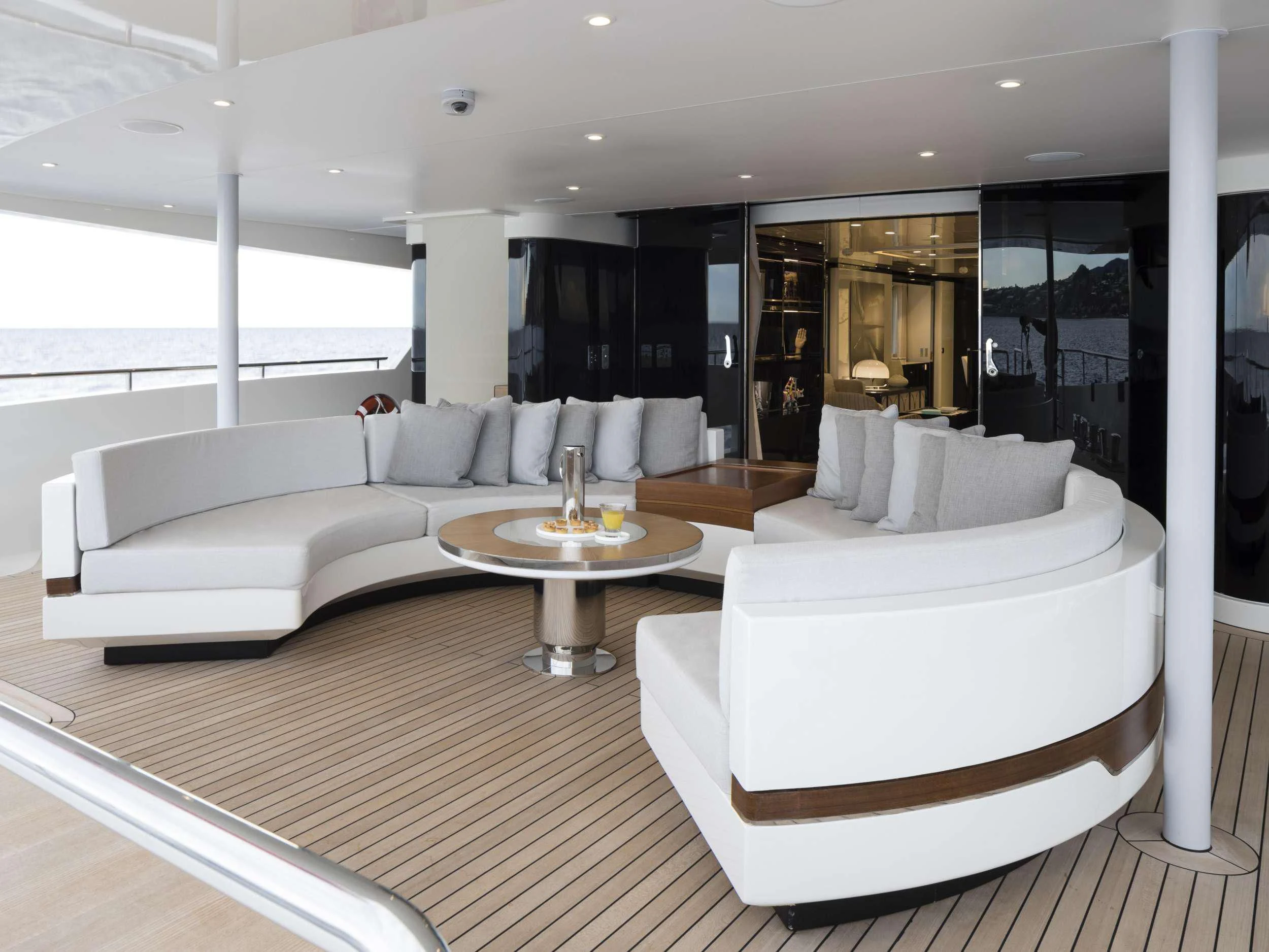 a living room with a large window aboard ANDIAMO Yacht for Sale