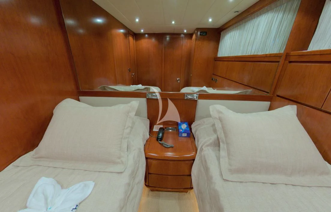 a room with a bed and a table aboard ABSOLUTE KING Yacht for Sale
