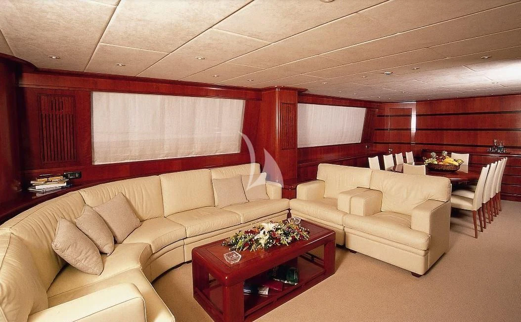 a living room with a couch and a table aboard ABSOLUTE KING Yacht for Sale