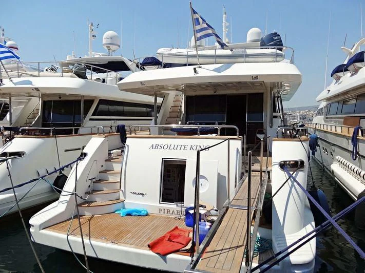 a boat docked at a pier aboard ABSOLUTE KING Yacht for Sale