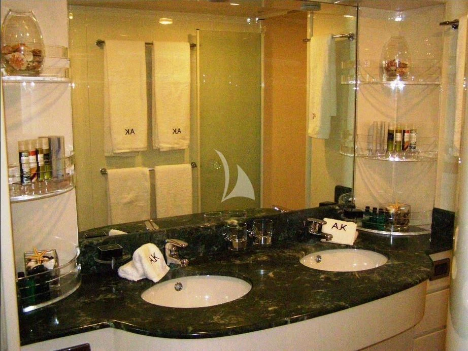 a bathroom with sinks and mirrors aboard ABSOLUTE KING Yacht for Sale