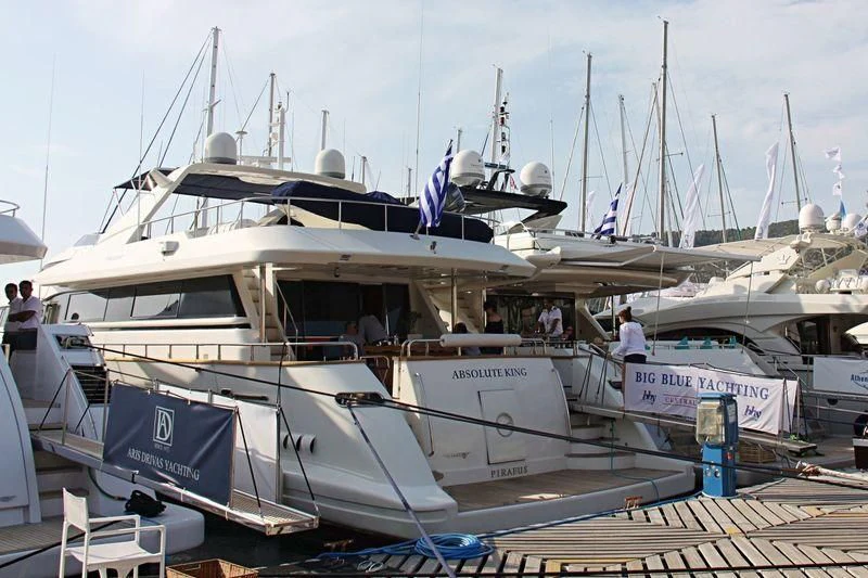a boat docked at a pier aboard ABSOLUTE KING Yacht for Sale