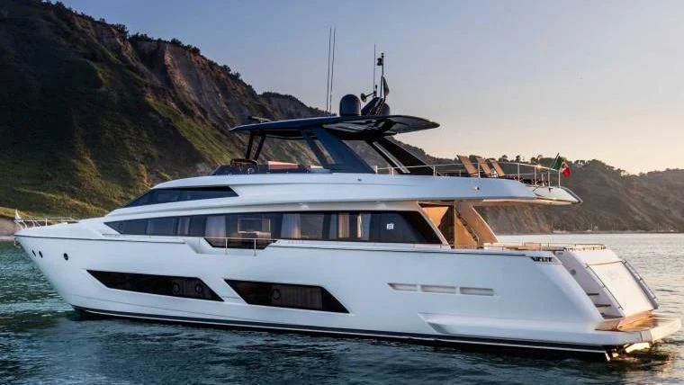 a white yacht on the water aboard TO INDIA Yacht for Sale