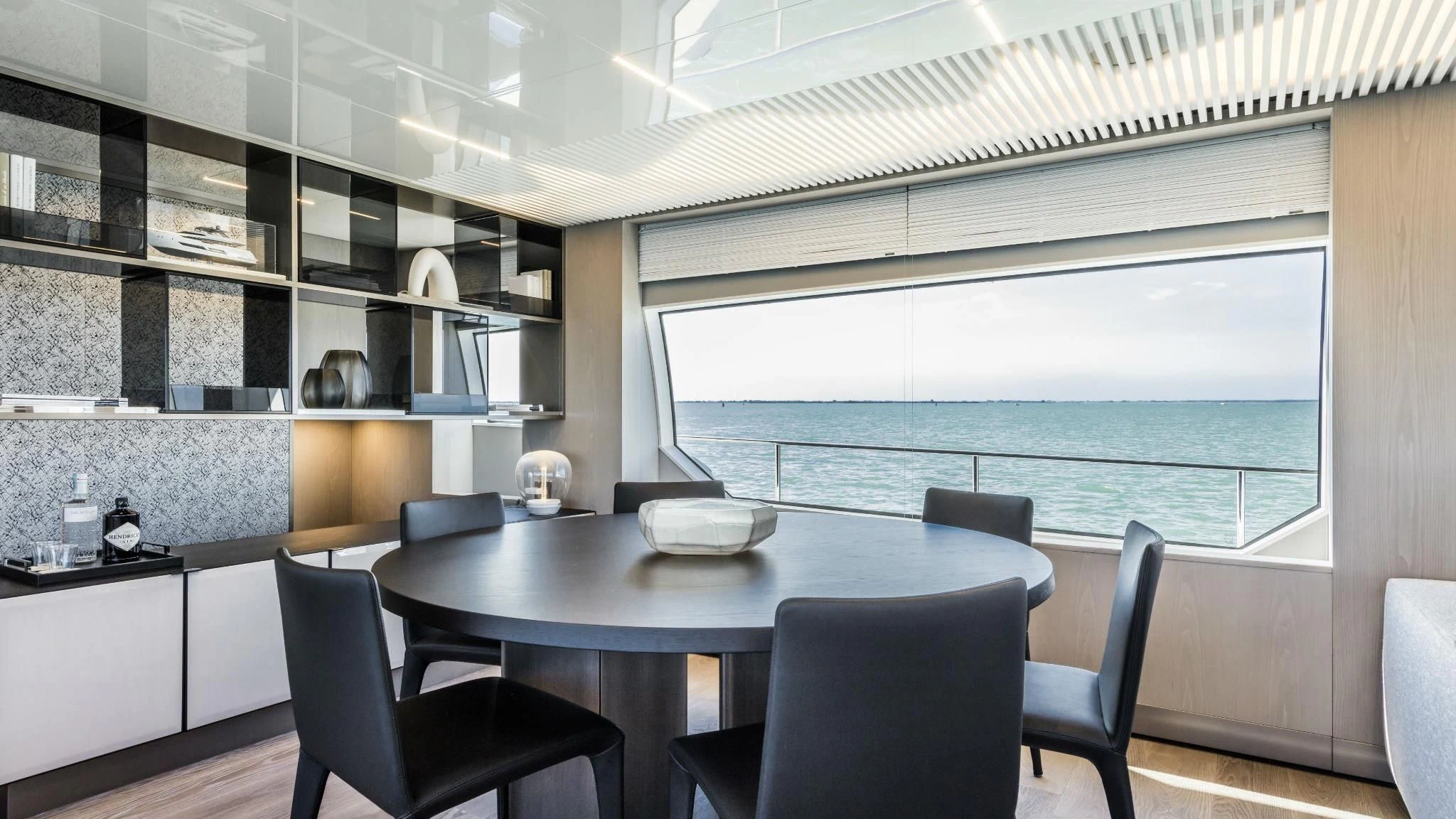 a room with a table and chairs aboard TO INDIA Yacht for Sale