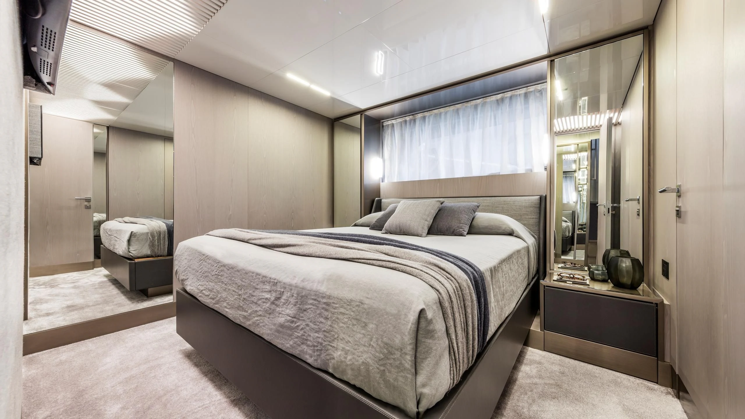 a bed in a room aboard TO INDIA Yacht for Sale