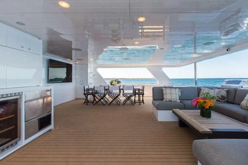 a living room with a large glass ceiling aboard OCEAN DREAM Yacht for Sale