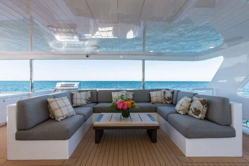 a living room with a large window aboard OCEAN DREAM Yacht for Sale