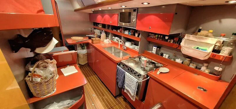 a kitchen with a lot of clutter aboard ALMUNDARVI Yacht for Sale