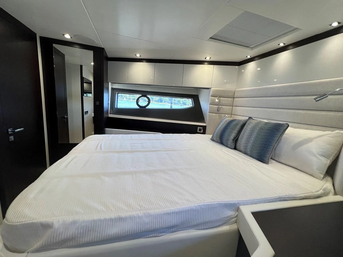 a bed in a room aboard 66 MANHATTAN Yacht for Sale