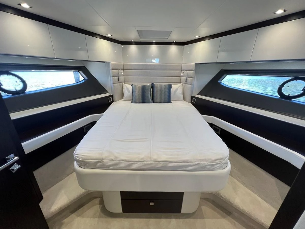 a bed in a room aboard 66 MANHATTAN Yacht for Sale