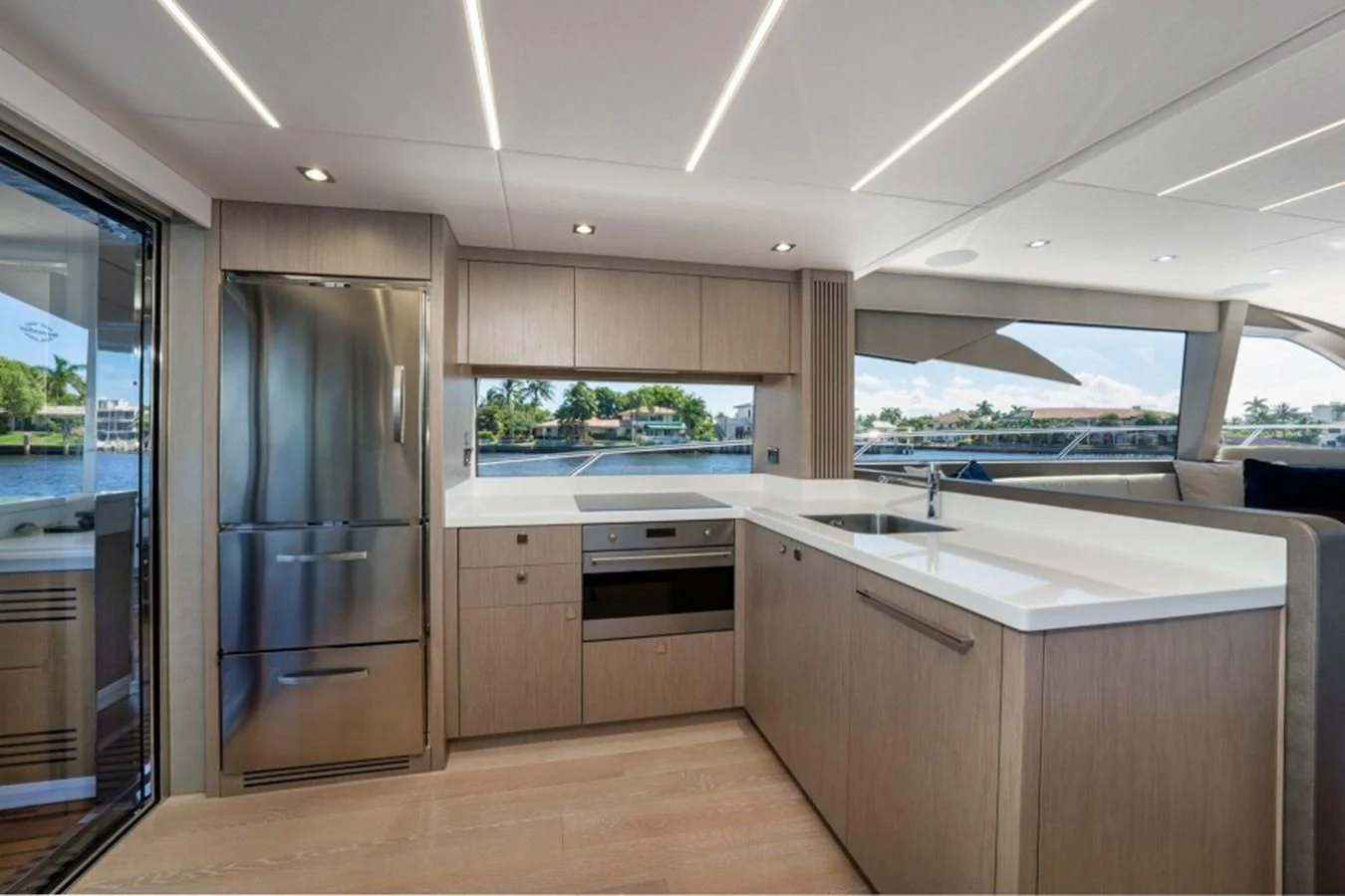 a kitchen with a large window aboard 66 MANHATTAN Yacht for Sale