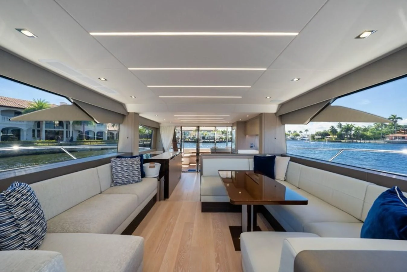 a room with a table and chairs aboard 66 MANHATTAN Yacht for Sale