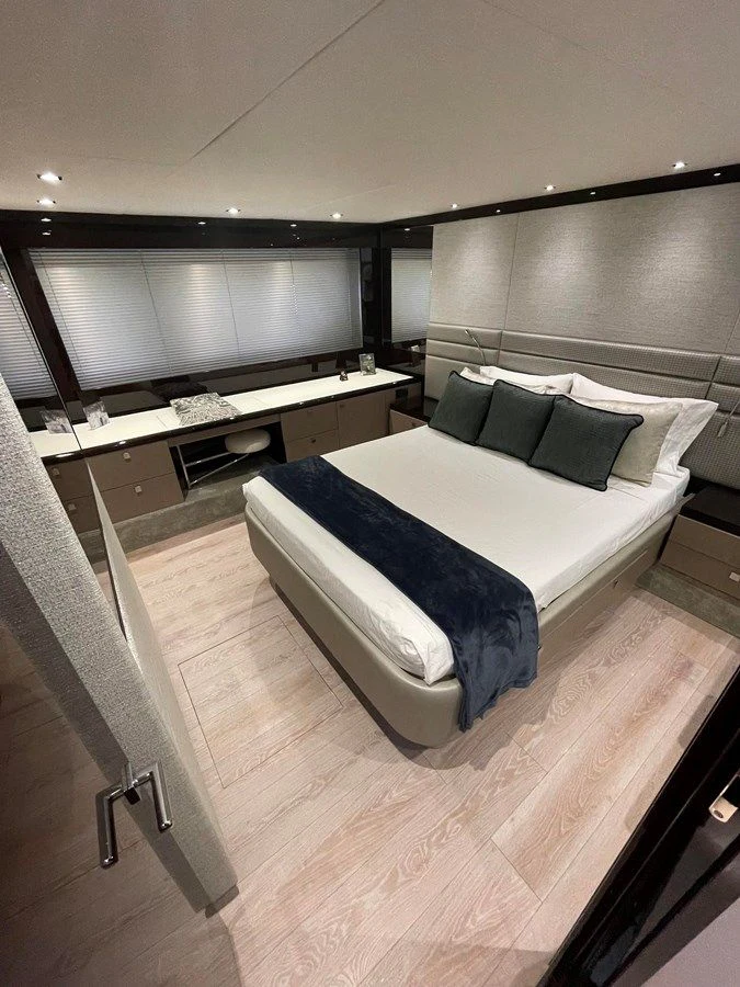 a bed in a room aboard 66 MANHATTAN Yacht for Sale