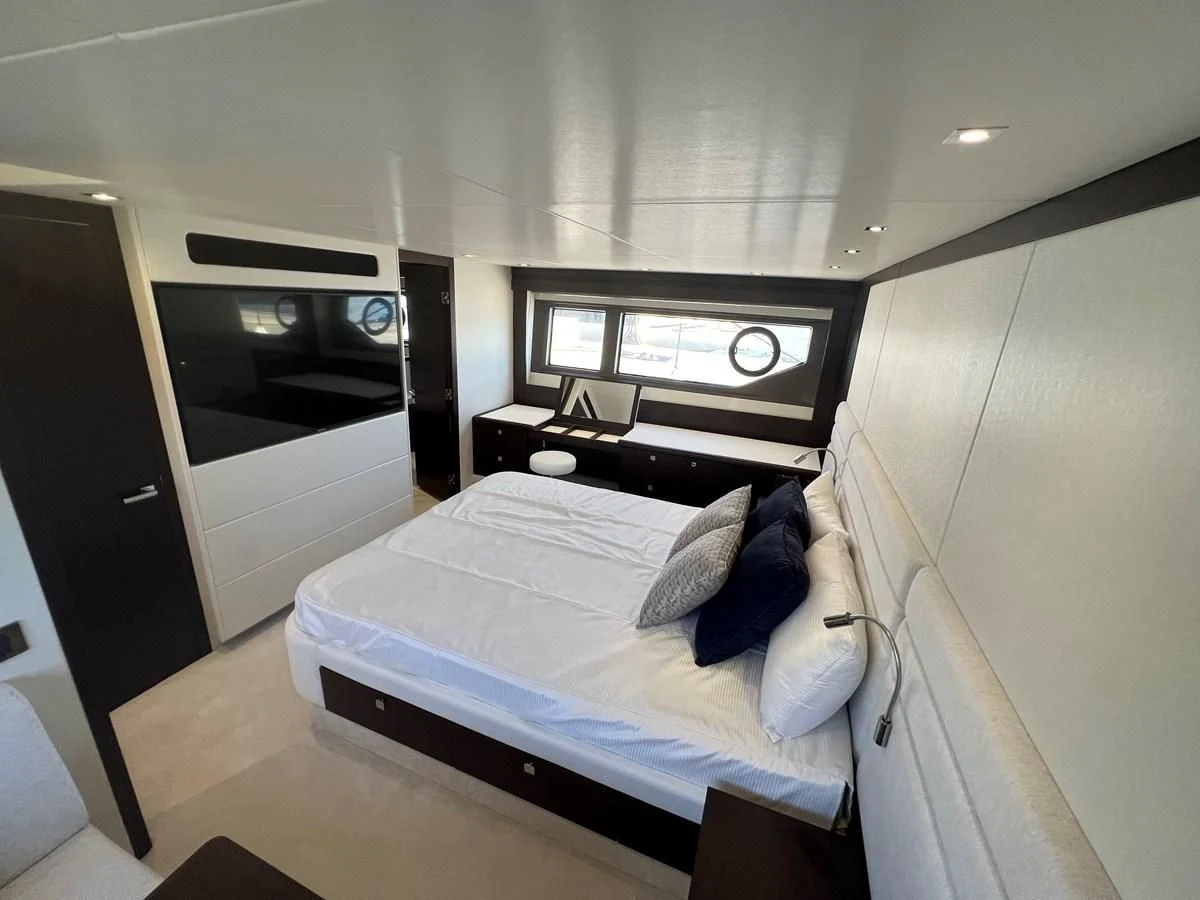 a bed in a room aboard 66 MANHATTAN Yacht for Sale
