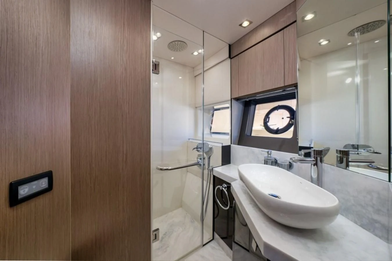a bathroom with a large mirror aboard 66 MANHATTAN Yacht for Sale