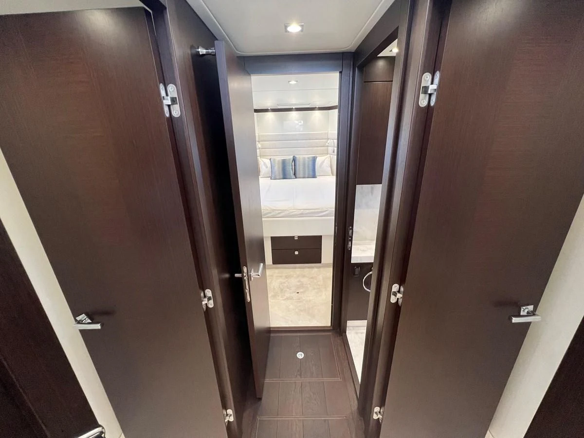 a hallway with doors aboard 66 MANHATTAN Yacht for Sale
