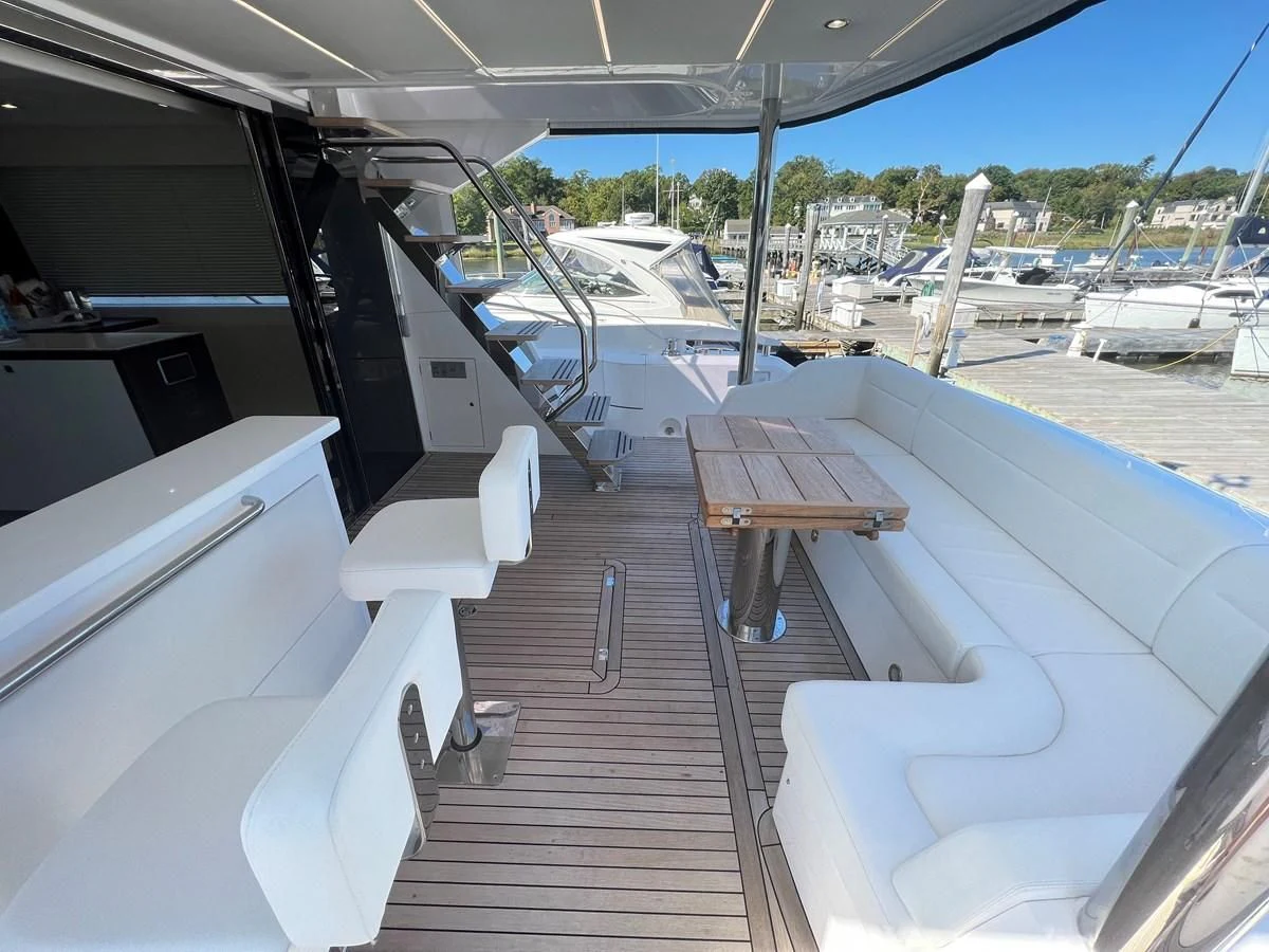 a boat dock with boats aboard 66 MANHATTAN Yacht for Sale