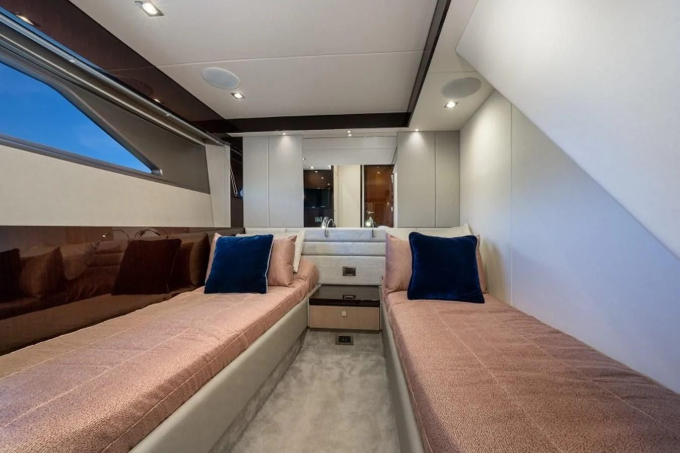 a room with a bed and a couch aboard 66 MANHATTAN Yacht for Sale