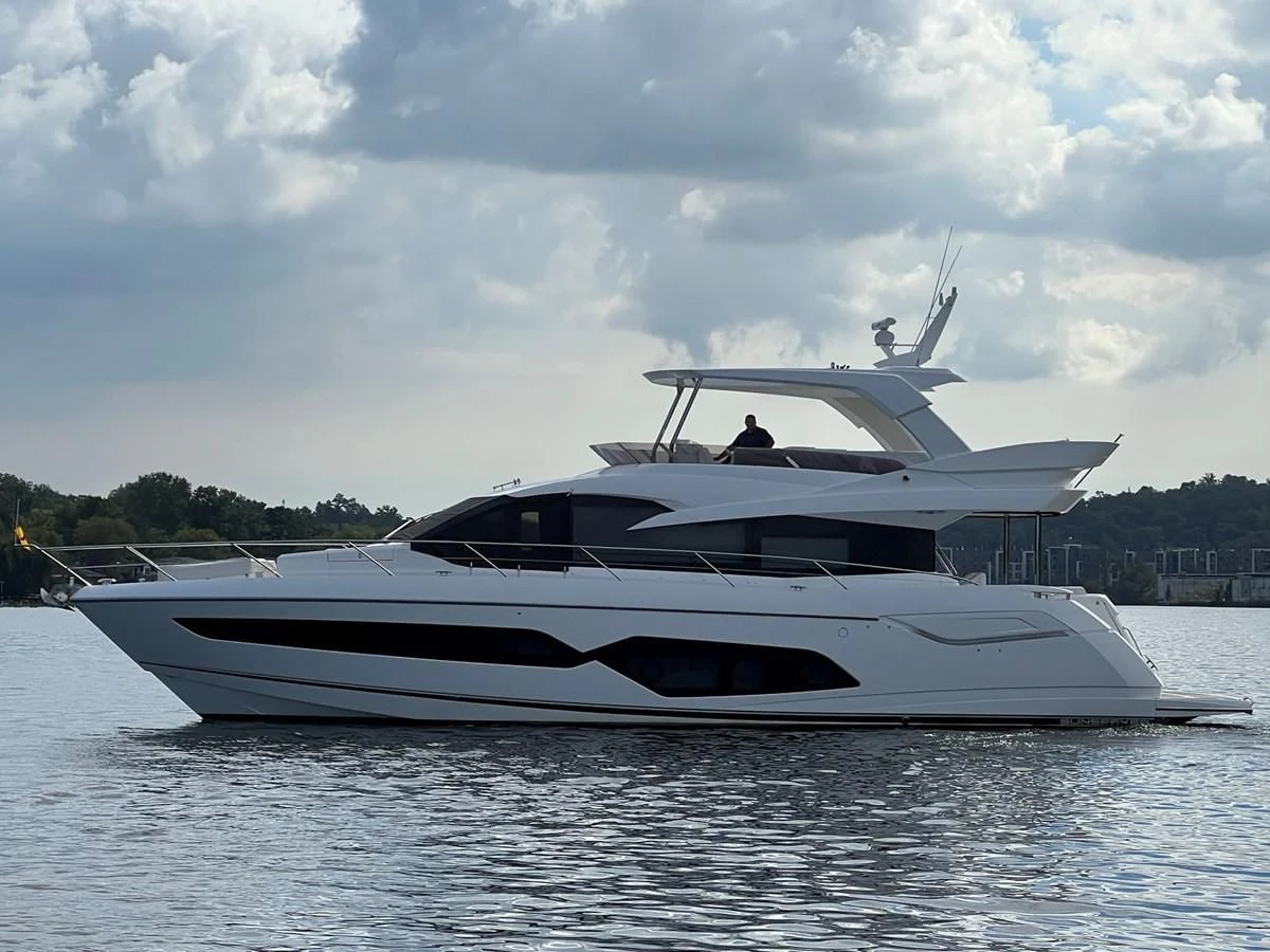 a white yacht on the water aboard 66 MANHATTAN Yacht for Sale