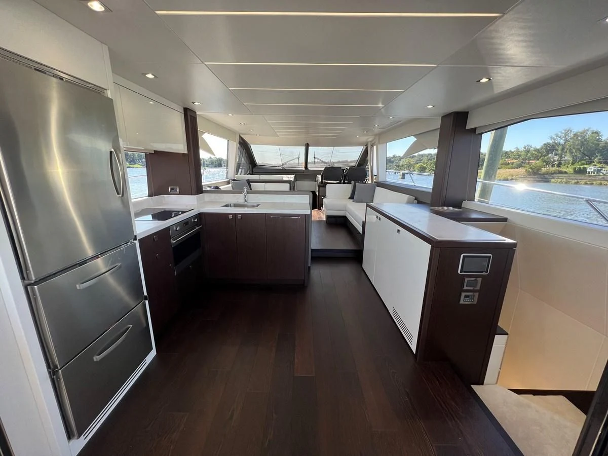 a kitchen with a large window aboard 66 MANHATTAN Yacht for Sale