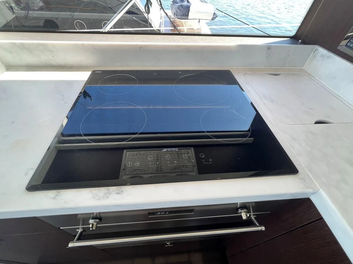 a black and silver computer aboard 66 MANHATTAN Yacht for Sale